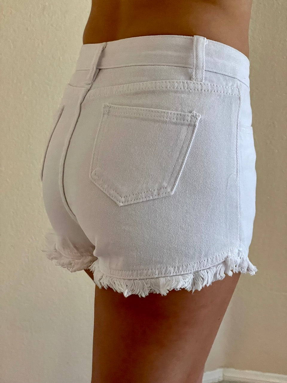 High Rise Frayed Raw Hem Denim Shorts in White