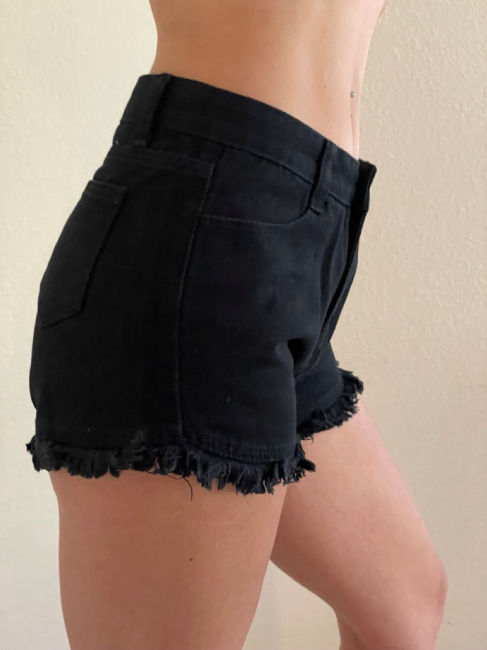 High Rise Frayed Raw Hem Denim Shorts in Black